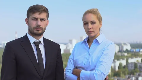 Financial specialists looking camera standing outdoors, professional lawyers 스톡 동영상 117217165