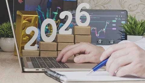 Financial strategy setup for 2026 featuring gold bars, real estate, digital.. Stock Photos