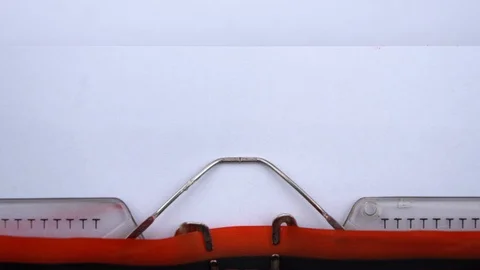 Financing - word printed on an old typewriter in red letters, close up. Stock Footage 126644965