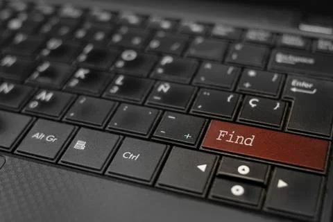 Find concept. Find key embedded in a computer keyboard Stock Photos