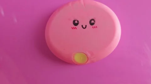 Find fun with a dumpling antistress toy as it creates different shapes Stock Footage 338406207