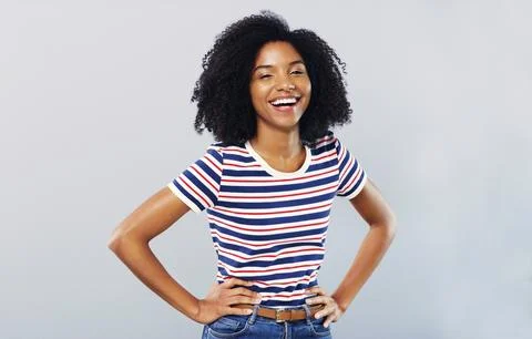 Find joy in the simple things. Studio shot of a confident young woman posing Stock Photos