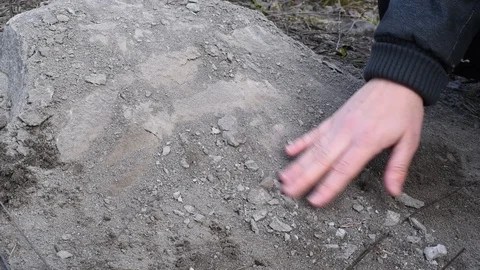 Finding an ancient object close-up in daylight Stock Footage 108012359