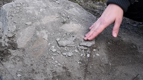 Finding an ancient object close-up in daylight Stock Footage 108012361