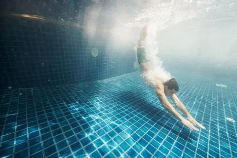 Finding comfort at the bottom of the pool Stock Photos
