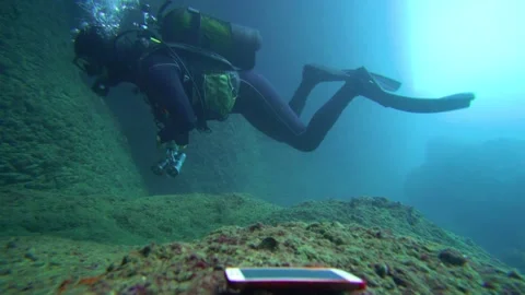 Finding a Lost Mobile Phone Underwater Stock Footage 146807025