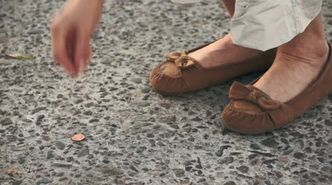 Finding a Lost Penny on the Street Stock Footage 11440509