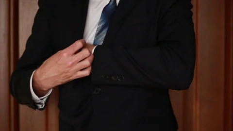 Finding money under the jacket Vídeo Stock 73505549