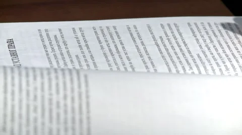Finding passage in book Vídeo Stock 2852071