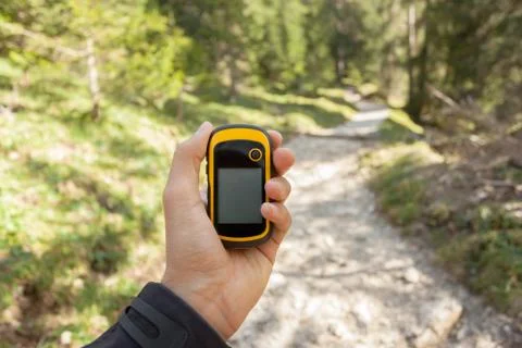 Finding the right position in the woods with a gps Stock Photos