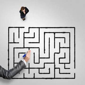 Finding right problem solution Top view of puzzled businesswoman looking a... Stock Photos