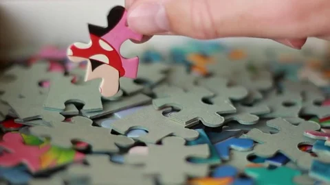 Finding a right puzzle piece 스톡 동영상 77021428