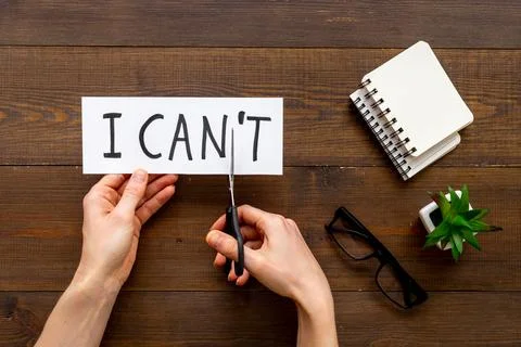 Finding solution concept. Changing words I cannot to I can with scissors Stock Photos