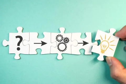 Finding solution for a problem concept with jigsaw puzzle pieces 스톡 사진