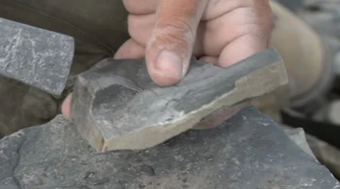 Finding a trilobite in slate 2 Stock Footage 8547197