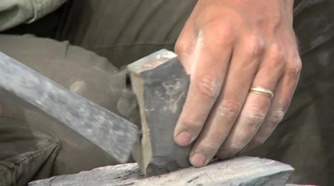 Finding a trilobite in slate Stock Footage 8547010