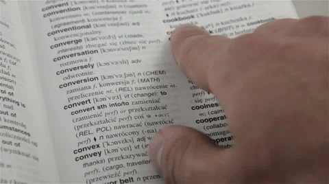 Finding a Word in the Dictionary Stock Footage 54637412