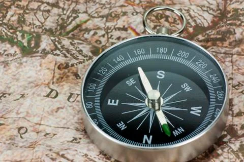 Finding Your Direction - Compass and Map Stock Photos