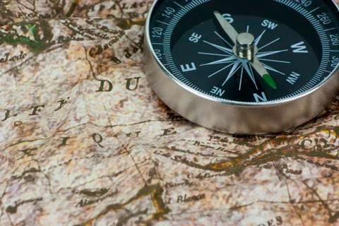 Finding Your Direction - Compass and Map Stock Photos
