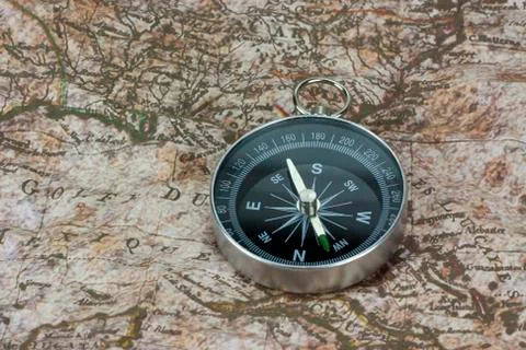 Finding Your Direction - Compass and Map Stock Photos