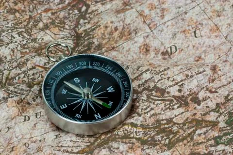 Finding Your Direction - Compass and Map Stock-Fotos