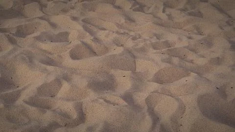 Fine beach sand texture in close-up, ideal as a conceptual natural background Foto stock