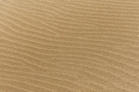 Fine beach sand with waves Resolution and high quality beautiful photo Фото
