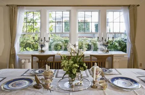 Fine China On Table In Luxury Dining Room