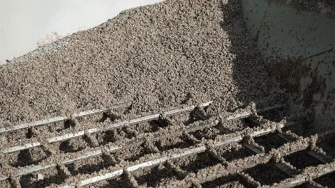 Fine crushed stone in the gutter of the shale shaker. Slow motion Stock Footage 200869373