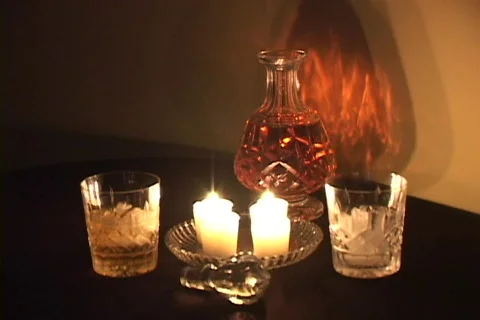 Fine crystal decanter in candlelight Stock Footage 73882