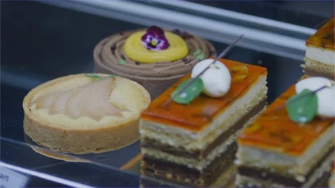 Fine desert sweets on display at cafe, agricultural show Stock Footage 106645904