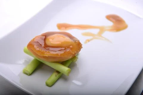Fine dining of Abalone in a restaurant Stock Photos