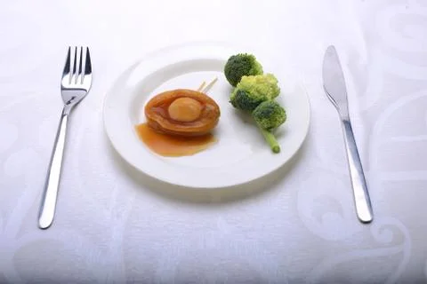 Fine dining of Abalone in a restaurant Stock Photos