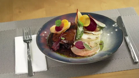 Fine dining meal with meat on the restaurant table Stock Footage 236994779