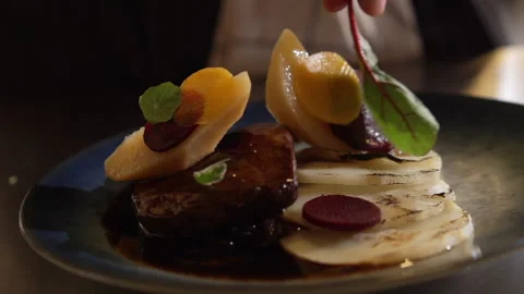 Fine dining meal with meat on the restaurant table Video stock 236994804