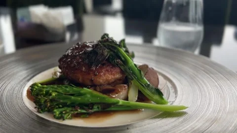 Fine Dining Plant Based Soy Meat Steak with Black Pepper Sauce and Broccoli Stock Footage 345964865