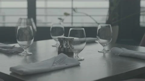 Fine dining table, cutlery, wine glasses, empty glasses, napkins Stock Footage 201929042