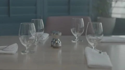 Fine dining table, fancy cutlery, wine glasses, empty glasses, empty cups Stock Footage 201928960