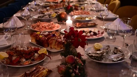 Fine dining table setting for a christmas seafood dinner party Stock Footage 325561654