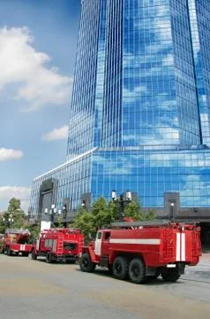 Fine-engine vehicles at office building Stock Photos