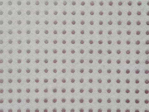 Fine fabric surface with regular pink spots arranged in grid pattern for de.. Stock Photos