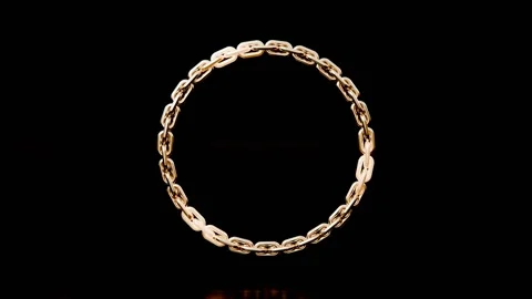 Fine gold chain wheel standing upright spinning link loop 動画素材 343873587