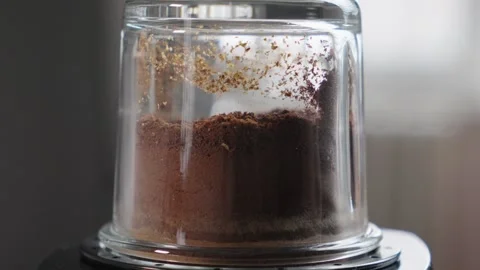 Fine Grinding Ground Coffee in Coffee Grinder Close Up Stock Footage 330537364