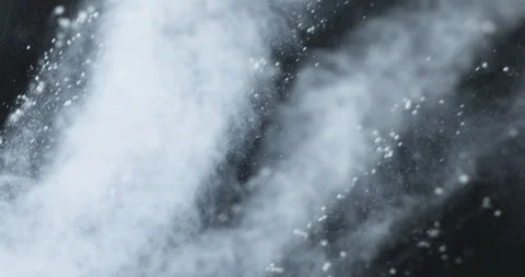 Fine powder dust exploding into soft airborne particles in slow motion Stock Footage 332702365