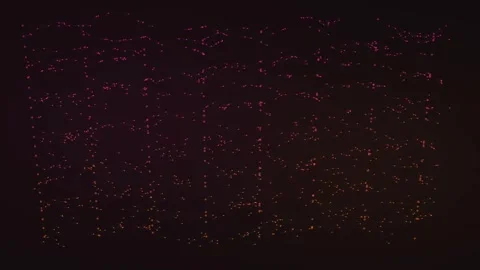 Fine red and orange matrix-like marks flicker and subtly shift across a dar.. 库存影片 347290000