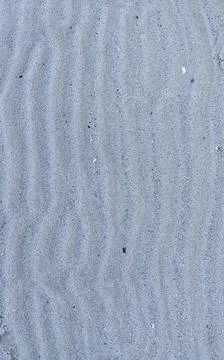 Fine sand texture with natural wave patterns minimal beach background Fotos de archivo