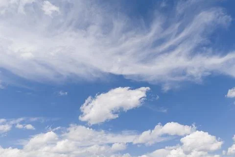 Fine Wispy Cloud Patterns in a Bright Blue Sky Stock Photos