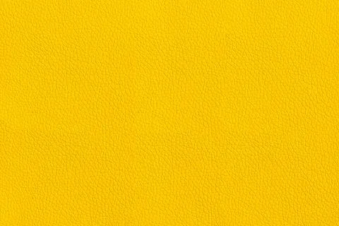 Fine yellow leather texture for background Stock Photos