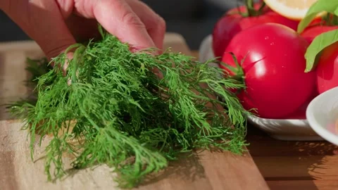 Finely chop the dill Stock Footage 318226853