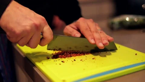 Finely chopping bacon in slow motion Stock Footage 149118704